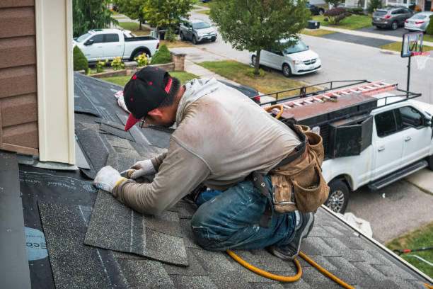 Professional Roofing technician working in Champion, PA
